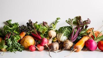 A vibrant array of fresh herbs and vegetables, forms a captivating display on the clear white surface. photo