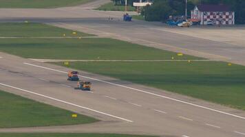 Special trucks equipment cleans the runway at the airport. Machine technology for airport maintenance video