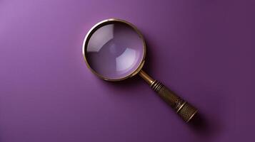 A single antique magnifying glass, placed against a muted colored background, symbolizes curiosity and discovery photo