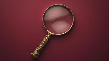 A single antique magnifying glass, placed against a muted colored background, symbolizes curiosity and discovery photo