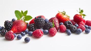 A bountiful selection of fresh, vibrant fruits are scattered artfully on the pristine white background photo