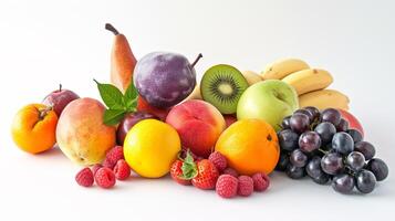 A bountiful selection of fresh, vibrant fruits are scattered artfully on the pristine white background photo