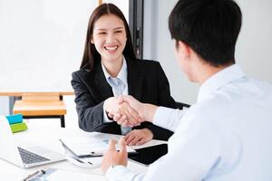 Friendly Handshake at Business Meeting photo