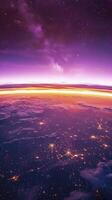 View of the purple and orange light through the earth's horizon. photo