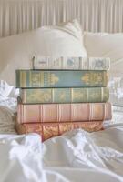 classic hardcover books with beautiful pastel covers photo