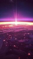 View of the purple and orange light through the earth's horizon. photo