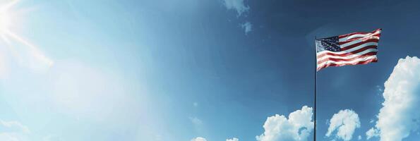 American flag against blue sky photo