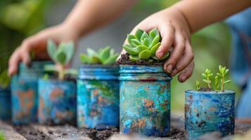 Young gardener taking care of house plants in old reused jars over wooden table photo