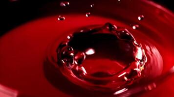 Super slow motion red wine. High quality FullHD footage video