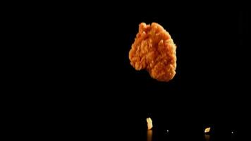 Super slow motion chicken nuggets. High quality FullHD footage video