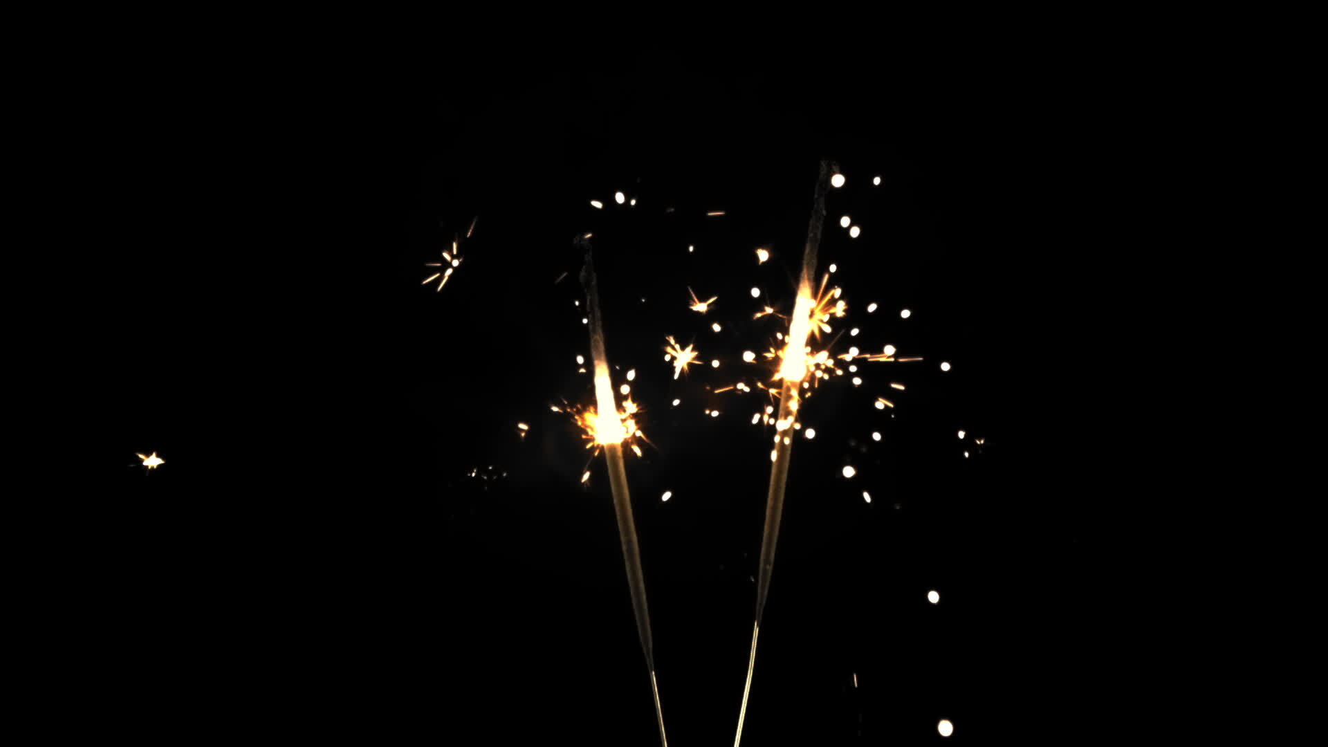 Bengal candles on a black background burn brightly. Filmed is slow