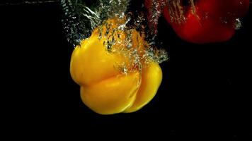 Super slow motion sweet pepper . High quality FullHD footage video