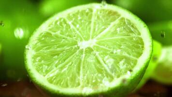 Super slow motion fresh limes. High quality FullHD footage video