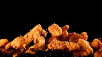 Super slow motion chicken nuggets. High quality FullHD footage video