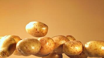 Super slow motion potatoes fly up and fall down. High quality FullHD footage video