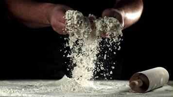 Flour in the hands of a cook. Filmed on a high-speed camera at 1000 fps. High quality FullHD footage video
