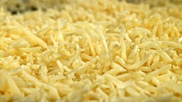 Shredded mozzarella cheese. Filmed on a high-speed camera at 1000 fps. High quality FullHD footage video