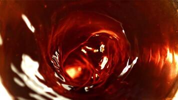 Whirlpool of cola. Filmed is slow motion 1000 fps. High quality FullHD footage video