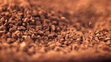 Super slow motion soluble coffee pours into a heap. Macro background.Filmed on a high-speed camera at 1000 fps. video