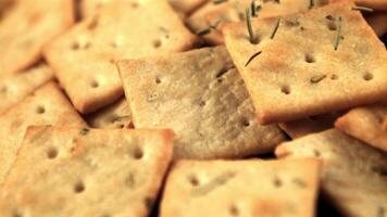 The super slow motion of the rosemary falls on the cookies. Macro background. Filmed on a high-speed camera at 1000 fps. video