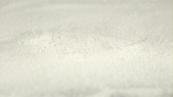 Super slow motion flour is poured into a baking heap. Macro background. Filmed on a high-speed camera at 1000 fps. video