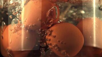 Super slow motion eggs are boiled underwater with air bubbles. Macro background. Filmed on a high-speed camera at 1000 fps. video