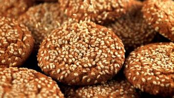 Super slow motion on the oat biscuit falls sesame. Macro background.Filmed on a high-speed camera at 1000 fps. video