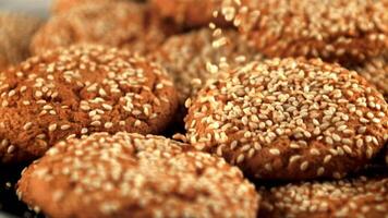 Super slow motion on fresh oatmeal cookies fall sesame. Macro background. Filmed on a high-speed camera at 1000 fps. video