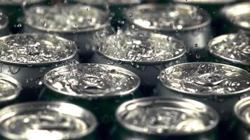 Super slow motion on tins with beer drop drops of water with spray. Macro background. Filmed on a high-speed camera at 1000 fps. video