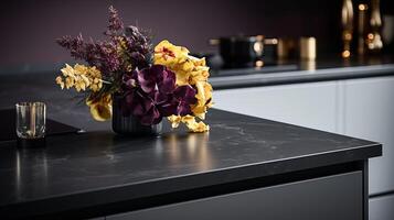 A Black Table Top With a Vase of Flowers. . photo