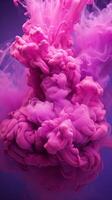 Pink acrylic colors and ink in water. Abstract background. . photo