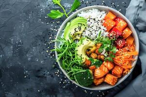 Bowl with salmon, avocado and other ingredients. Healthy food. . photo