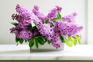 A bouquet of beautiful lilacs in a vase. . photo