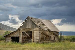 old rustic log barn photo