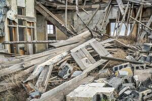 collapsed old wooden house photo