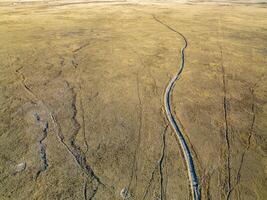 ranch road and cattle trails - aerial view photo