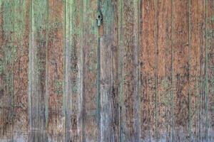 rustic grunge wooden gate painted green photo