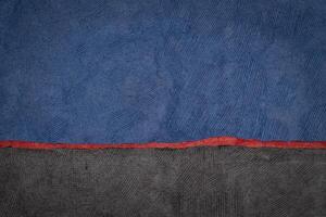 abstract landscape in blue, black and red photo