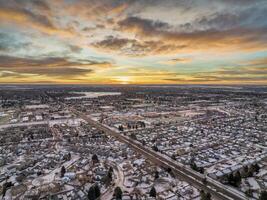 winter sunrise over of Fort Collins and plains in Colorado photo