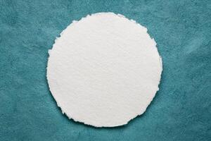 round sheet of blank white watercolor paper photo