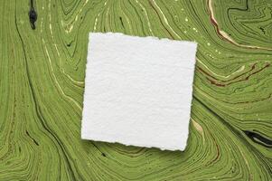 sheet of white Khadi rag paper photo