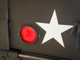 white star on vintage American military vehicle, World War II era photo