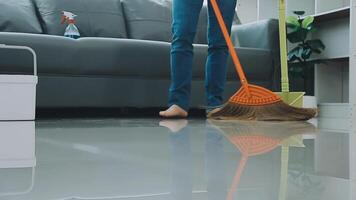 Woman cleaning table using rag and diffuser at home. video