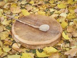 shaman frame drum with a beater photo