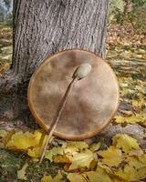 shaman frame drum with a beater photo