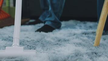 Woman cleaning table using rag and diffuser at home. video