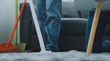 Woman cleaning table using rag and diffuser at home. video