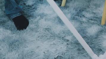 Woman cleaning table using rag and diffuser at home. video