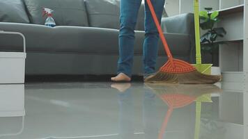 Woman cleaning table using rag and diffuser at home. video