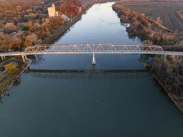 truss bridge over the Missouri River at Brownville, Nebraska aerial view of fall scenery photo